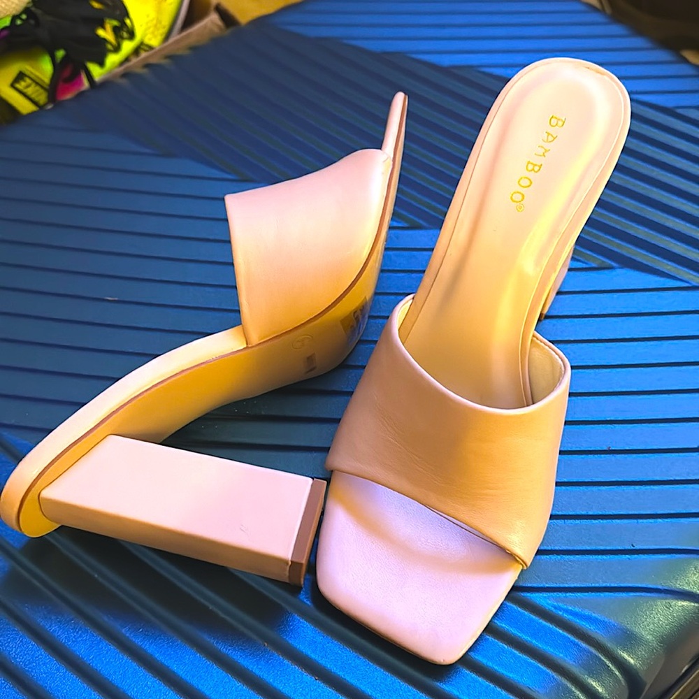 Neutral slide ons with a heel